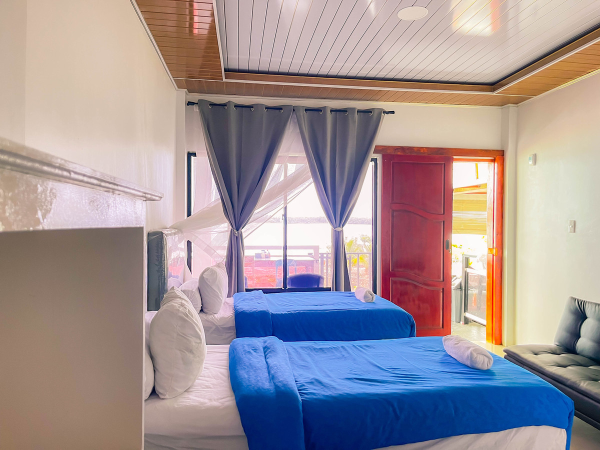 Ocean View Deluxe Room at Raffiel Nias with balcony facing the sea